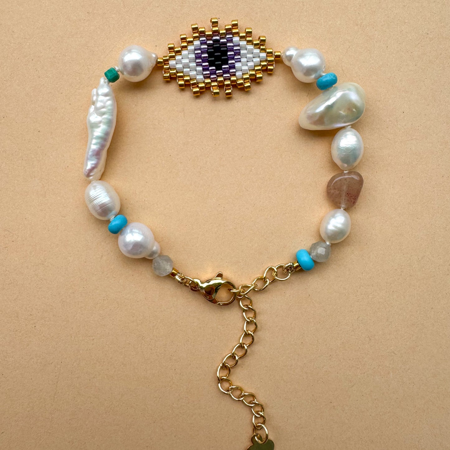 Evil eye with baroque pearls