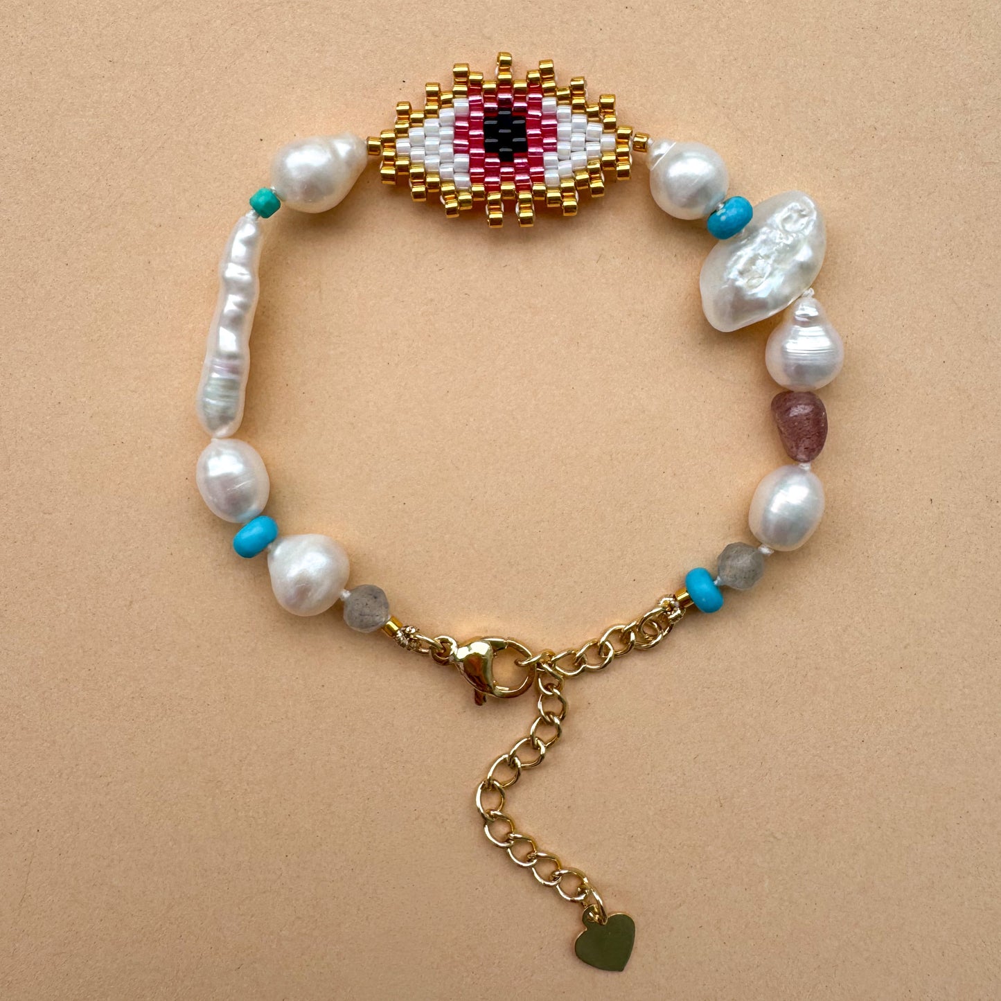 Evil eye with baroque pearls