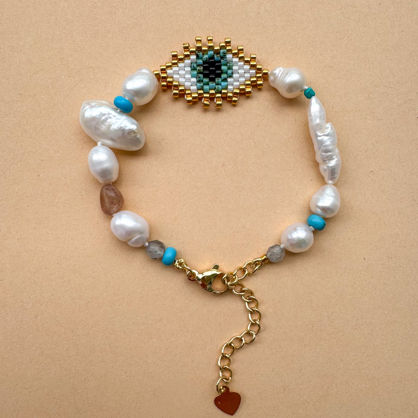 Evil eye with baroque pearls