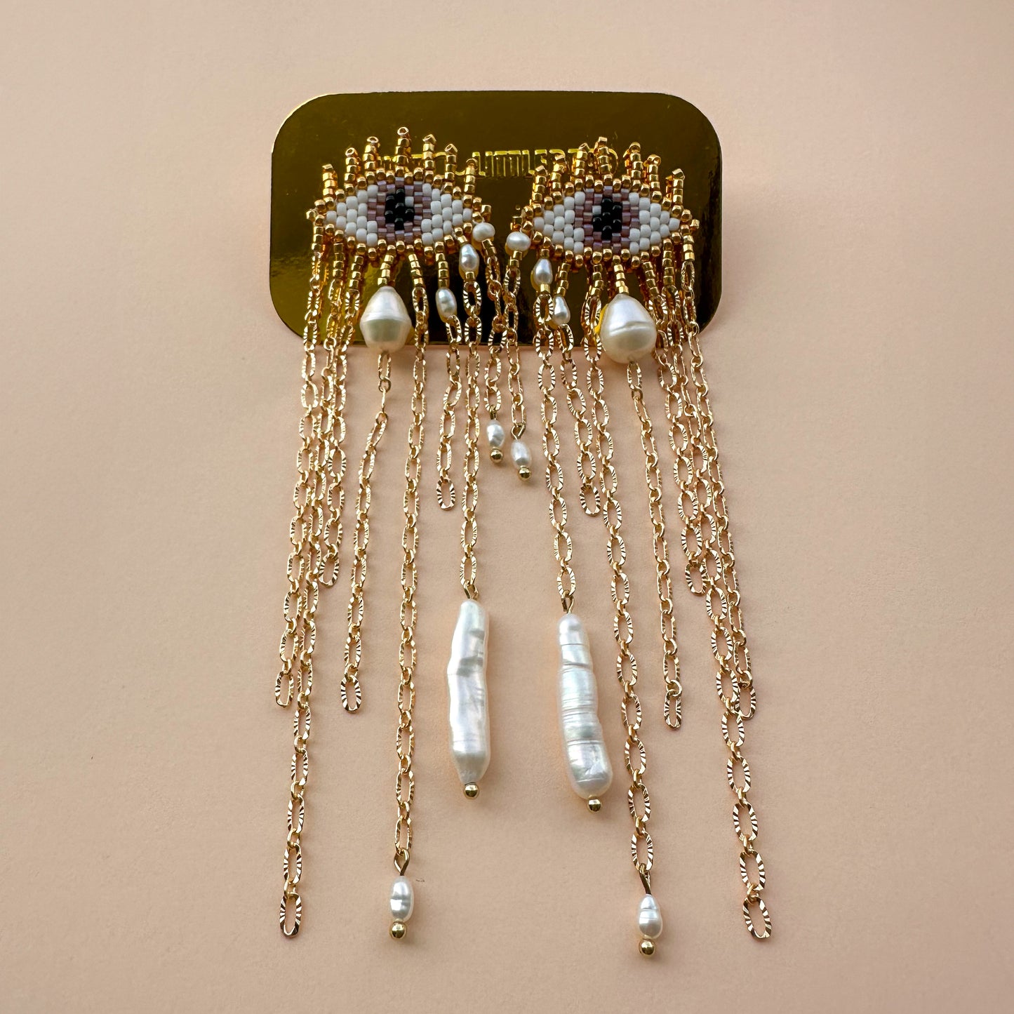 Evil Eye earrings with baroque pearls
