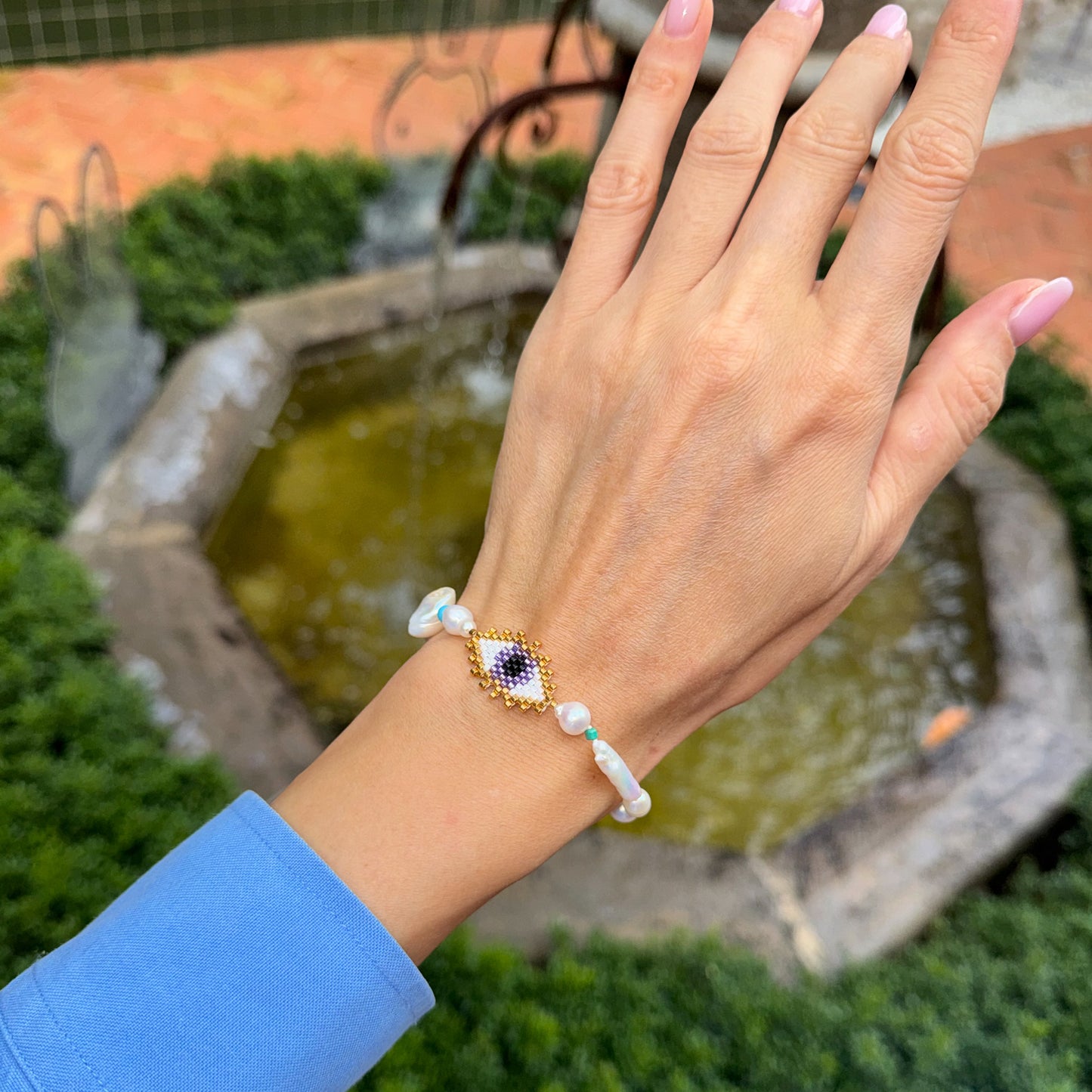 Evil eye with baroque pearls